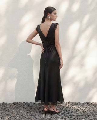 Back view of Romy silk midi dress in Onyx with low V back